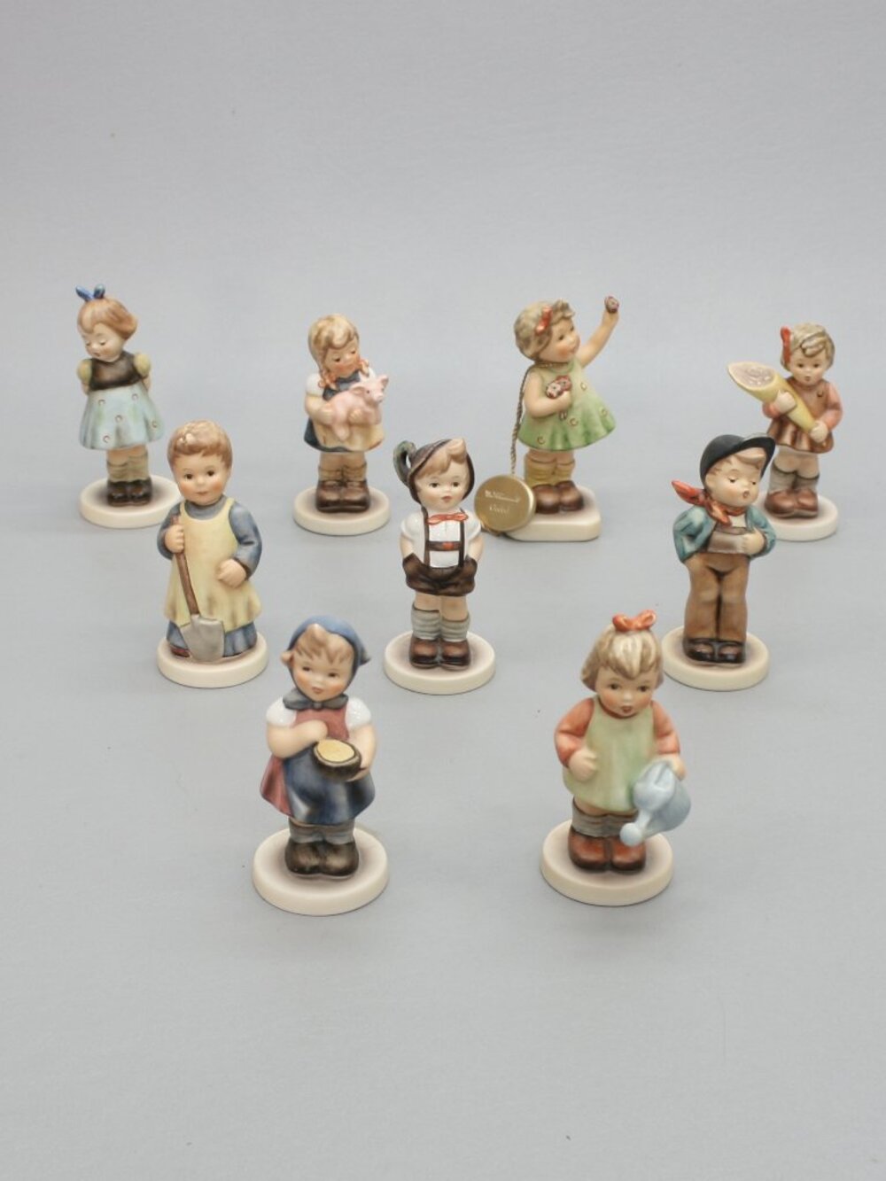 Lot of 9 Goebel M. I. Hummel Club Hand Painted Porcelain Figurines Germany TMK-7